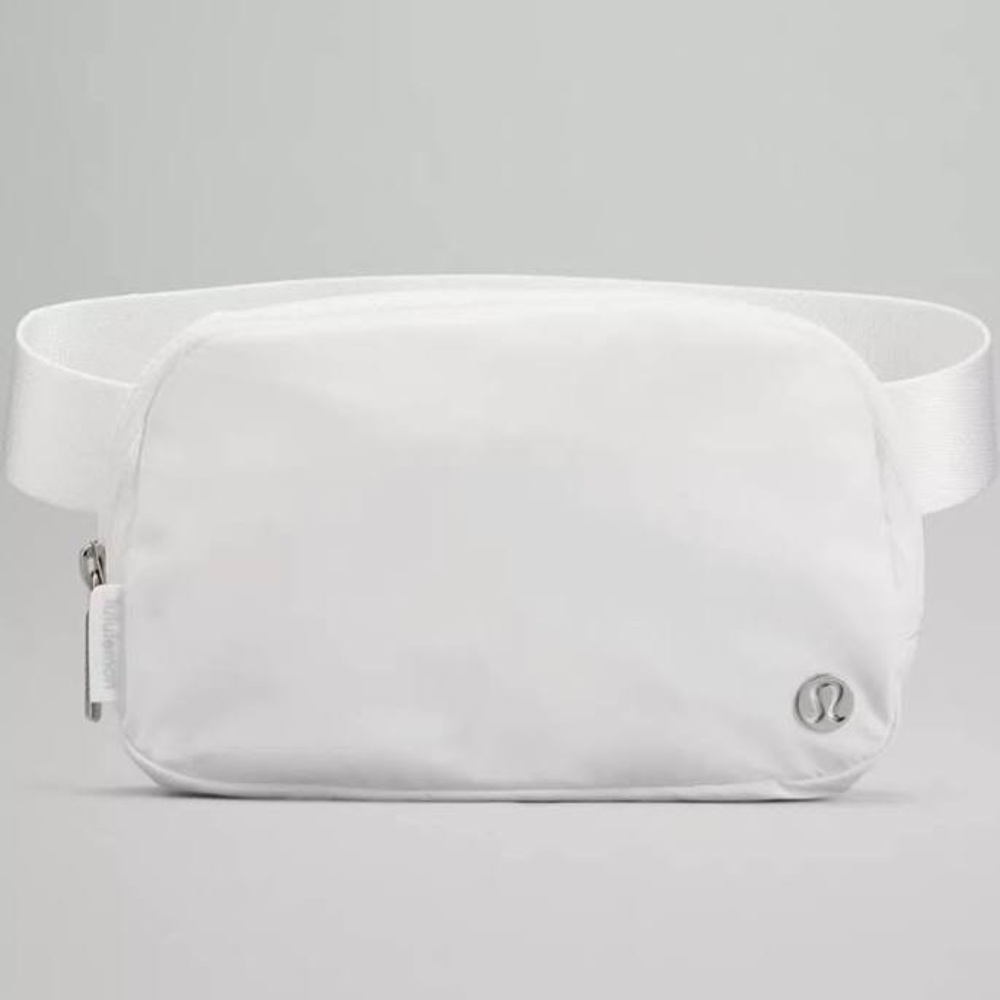 New With Tag super cute and trendy white Wear Everywhere Belt Body Bag!